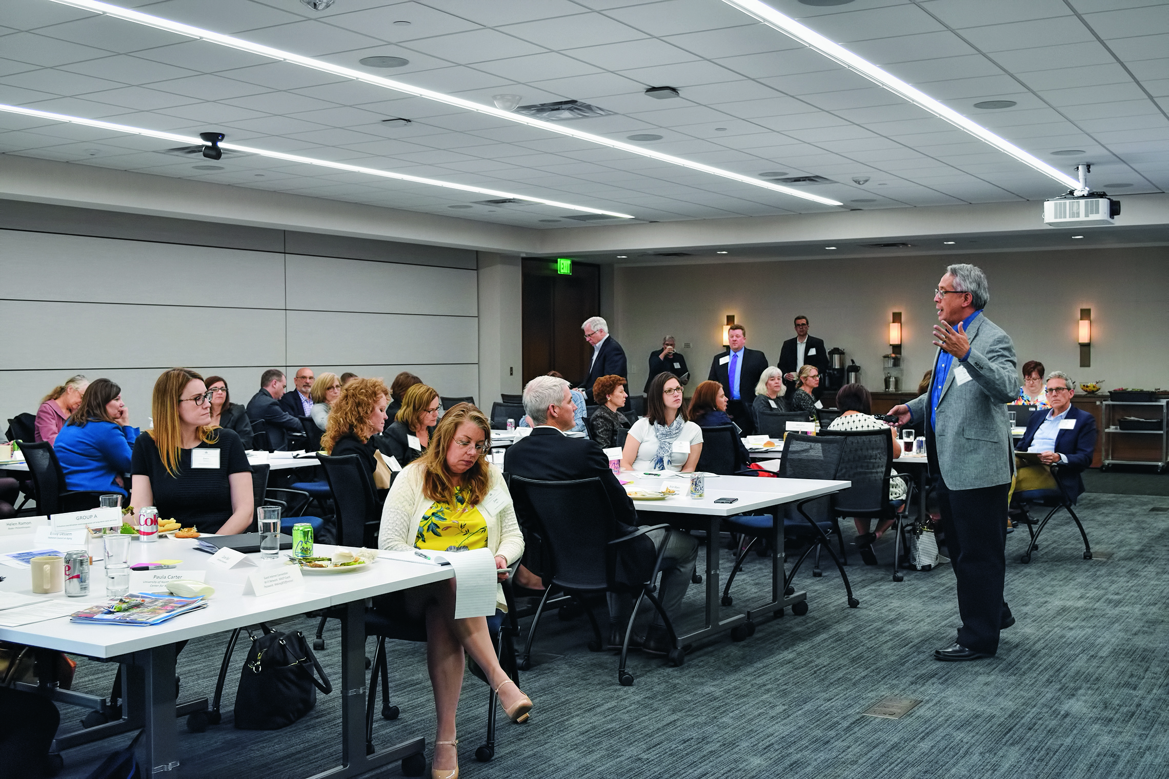 A Director shares content with multiple meeting attendees